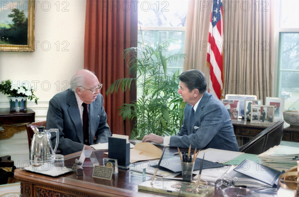 U.S. President Ronald Reagan meeting with Director of Central Intelligence William Casey in The Oval Office of the White House, Washington, D.C., USA, President Ronald Reagan White House Photographic Office, January 12, 1983