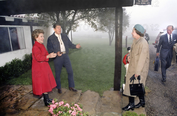 U.S. President Ronald Reagan and U.S. First Lady Nancy Reagan greeting Queen Elizabeth II upon her arrival for lunch, Prince Phillip in background, Rancho Del Cielo, Santa Barbara, California, USA, President Ronald Reagan White House Photographic Office, March 1, 1983