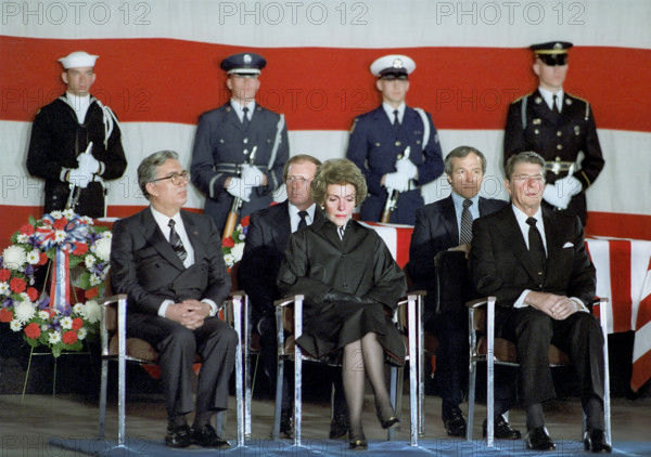 U.S. President Ronald Reagan and Nancy Reagan honoring the victims of the bombing of the U.S. Embassy in Beirut, Lebanon at Andrews Air Force Base, Prince George's County, Maryland, USA, President Ronald Reagan White House Photographic Office, April 23, 1983