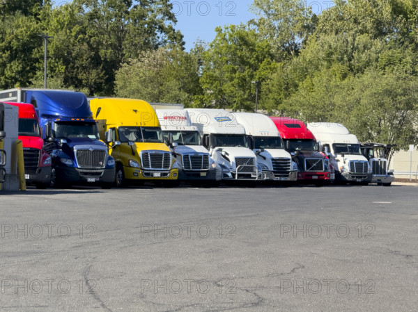 Freight trucks parked at rest area, on Interstate Highway 95,  Stamford, Connecticut, USA