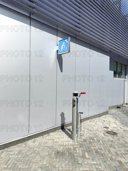 Bicycle tire pump and repair stand along urban bicycle path, Manhattan, New York City, New York, USA