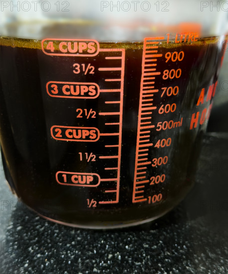 4 cups of beef stock in glass measuring cup