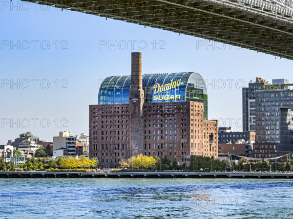 Former Domino Sugar Factory, now a mixed-use building called The Refinery, along East River, Williamsburg, Brooklyn, New York City, New York, USA