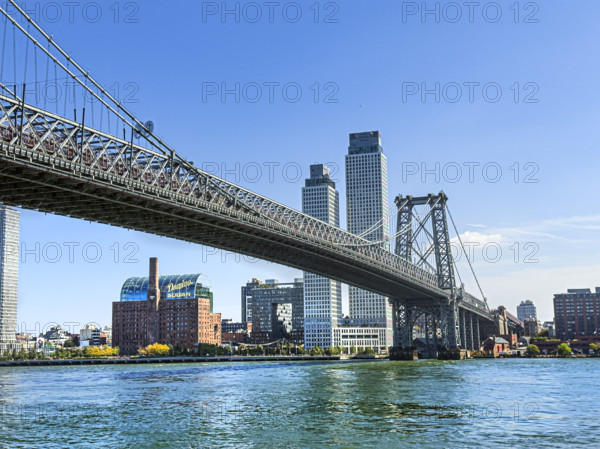 View of Williamsburg Bridge, East River and Williamsburg cityscape, Brooklyn, New York City, New York, USA