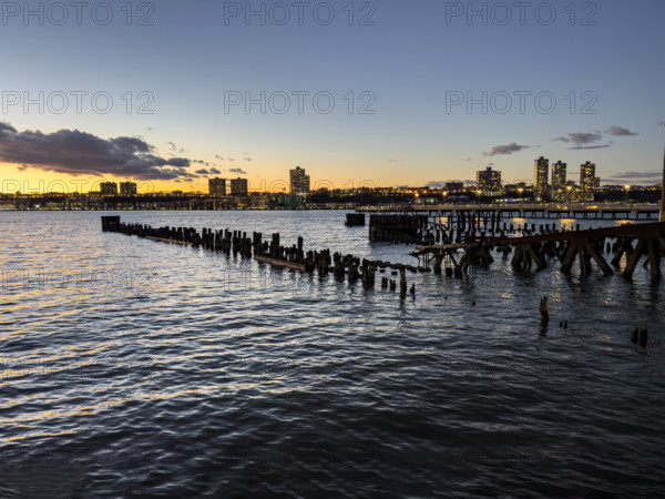 Hudson River and New Jersey landscape as viewed from Riverside Park South at sunset, Upper West Side, Manhattan, New York City, New York, USA