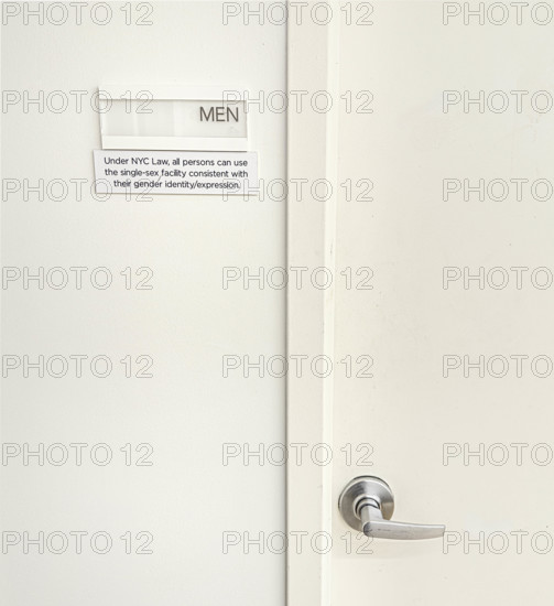 Sign for public bathroom allowing all persons the right to use single-sex facility consistent with their gender identity/expression, New York City, New York, USA