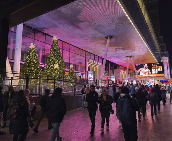 Crowd outside Madison Square Garden entrance at night, Seventh Avenue, Manhattan, New York City, New York, USA