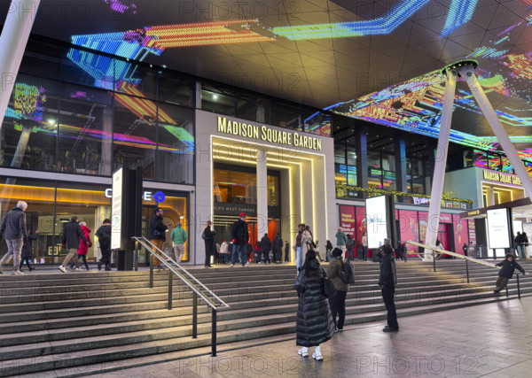 Crowd outside Madison Square Garden entrance at night, Seventh Avenue, Manhattan, New York City, New York, USA