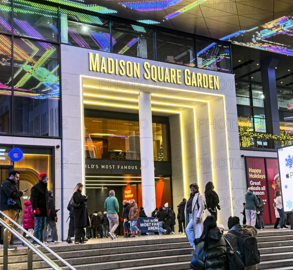 Crowd outside Madison Square Garden entrance at night, Seventh Avenue, Manhattan, New York City, New York, USA