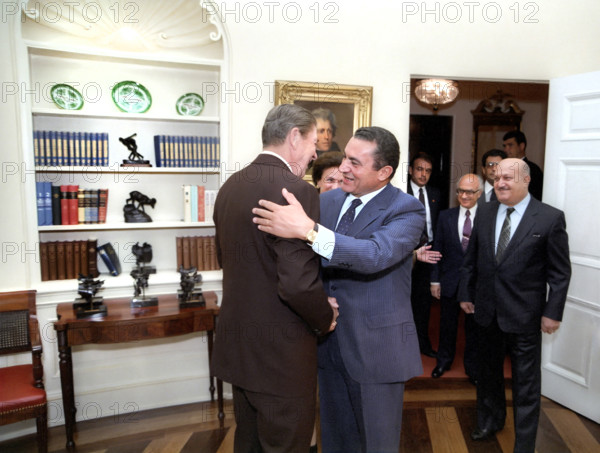 U.S. President Ronald Reagan meeting with President Hosni Mubarak of Egypt in the Oval Office of the White House, Washington, D.C., USA, President Ronald Reagan White House Photographic Office, September 30, 1983