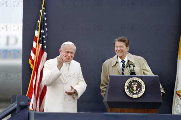 U.S. President Ronald Reagan and Pope John Paul II standing at podium at Fairbanks Airport, Alaska, USA, President Ronald Reagan White House Photographic Office, May 2, 1984