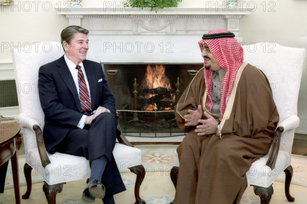 U.S. President Ronald Reagan and King Fahd of Saudi Arabia meeting in The Oval Office of the White House, Washington, D.C., USA, President Ronald Reagan White House Photographic Office, February 11, 1985