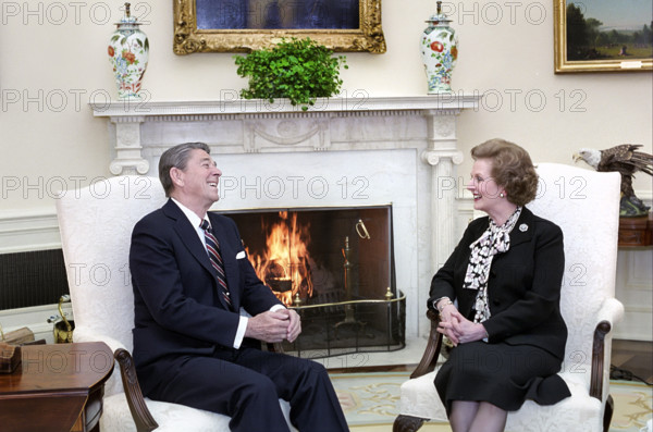 U.S. President Ronald Reagan meeting with British Prime Minister Thatcher in the Oval Office of the White House, Washington, D.C., USA, President Ronald Reagan White House Photographic Office, February 20, 1985