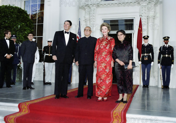 U.S. President Ronald Reagan, Chinese President Li Xiannian, U.S. First Lady Nancy Reagan and Li Xiannian's wife Lin Jiamei on the North Portico of the White House before a State Dinner, Washington, D.C., USA, President Ronald Reagan White House Photographic Office, July 23, 1985