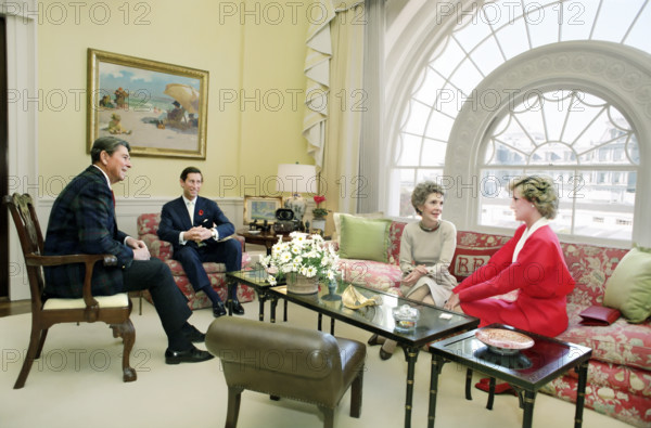 U.S. President Ronald Reagan and U.S. First Lady Nancy Reagan having tea with Prince Charles and Princess Diana in the White House Residence, Washington, D.C., USA, President Ronald Reagan White House Photographic Office, November 9, 1985