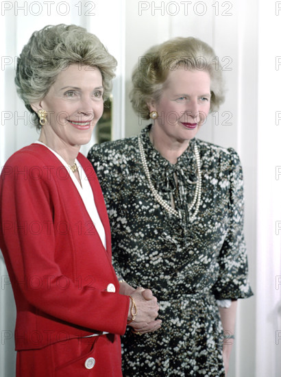 U.S. First Lady Nancy Reagan with British Prime Minister Margaret Thatcher during trip to the UK  for the Royal Wedding of Prince Andrew and Sarah Ferguson, 10 Downing Street, London, England, UK, President Ronald Reagan White House Photographic Office, July 22, 1986