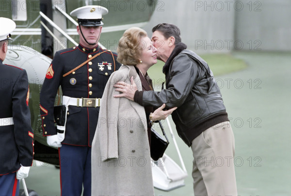 U.S. President Ronald Reagan welcoming British Prime Minister Margaret Thatcher before their meetings at Camp David, Frederick County, Maryland, USA, President Ronald Reagan White House Photographic Office, November 15, 1986