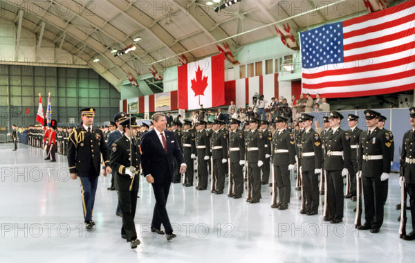 U.S. President Ronald Reagan inspecting troops during arrival ceremony at Upland Canadian Forces Base, Ottawa, Ontario, Canada, President Ronald Reagan White House Photographic Office, April 5, 1987