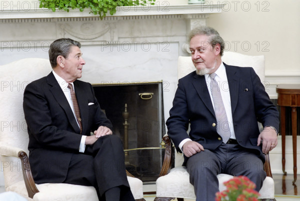 U.S. President Ronald Reagan meeting with Judge Robert Bork in the White House Oval Office, Washington, D.C., USA, President Ronald Reagan White House Photographic Office, July 1, 1987