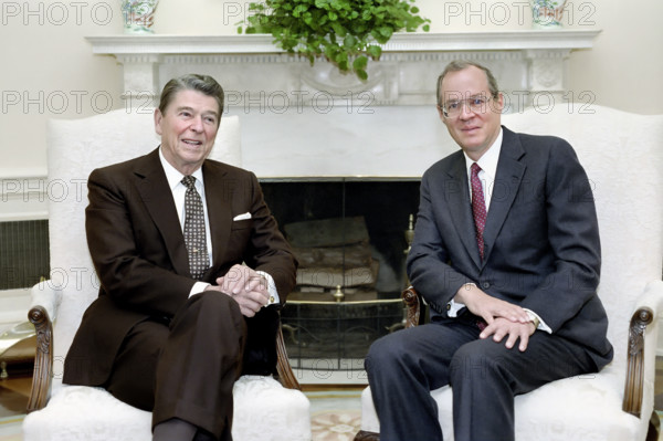 U.S. President Ronald Reagan meeting with Judge Anthony Kennedy in the White House Oval Office, Washington, D.C., USA, President Ronald Reagan White House Photographic Office, November 11, 1987