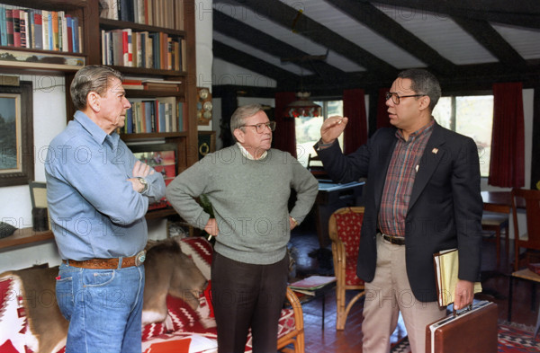 U.S. President Ronald Reagan (left) with Chief of Staff Howard Baker (center) and National Security Advisor Colin Powell (right), Rancho del Cielo, Santa Barbara, California, USA, President Ronald Reagan White House Photographic Office, November 25, 1987