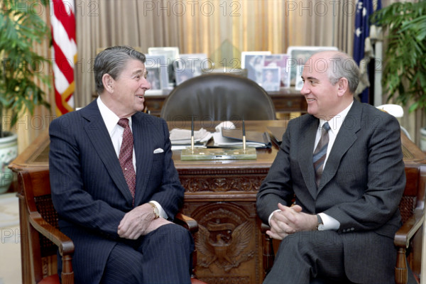 U.S. President Ronald Reagan and Soviet General Secretary Mikhail Gorbachev having meeting in the White House Oval Office, Washington, D.C., USA, President Ronald Reagan White House Photographic Office, December 9, 1987