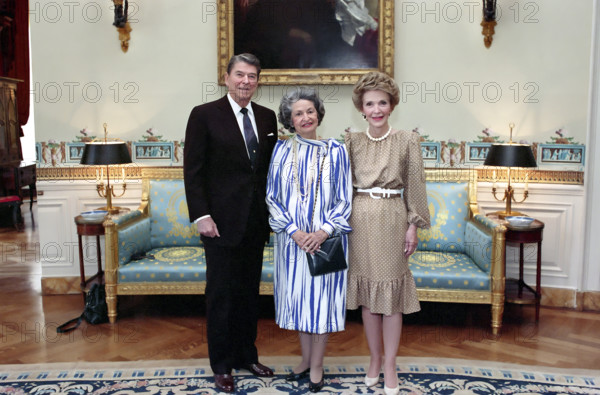 U.S. President Ronald Reagan and U.S. First Lady Nancy Reagan with former U.S. First Lady Claudia "Lady Bird" Johnson (center) during reception and presentation of Congressional Medal to Johnson, White House Blue Room, Washington, D.C., USA, President Ronald Reagan White House Photographic Office, April 28, 1988
