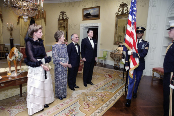 U.S. President Ronald Reagan, U.S. First Lady Nancy Reagan, King Hussein I and Queen Noor of Jordan meeting in the White House Yellow Oval Room prior to state dinner, Washington, D.C., USA, President Ronald Reagan White House Photographic Office, November 2, 1981