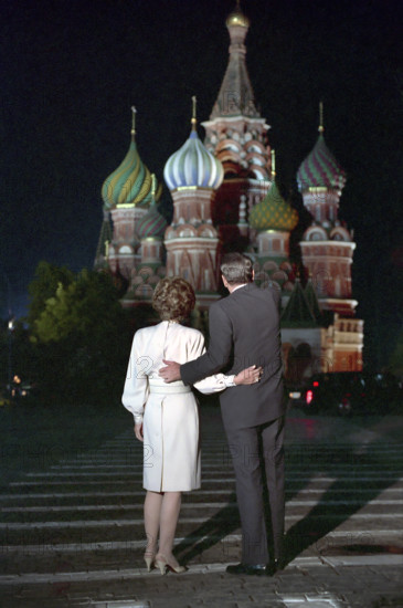 Rear view of U.S. President and U.S. First Lady Nancy Reagan visiting Red Square at night during Moscow Summit, Moscow, Russia, USSR, President Ronald Reagan White House Photographic Office, June 1, 1988
