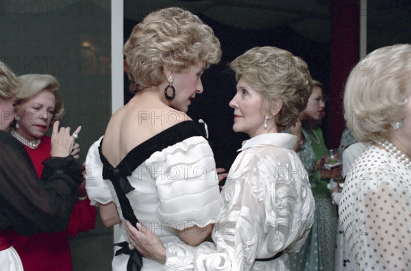 U.S. First Lady Nancy Reagan with American socialite Betsy Bloomingdale at a private party at the Bloomingdale residence, Beverly Hills, California, USA, President Ronald Reagan White House Photographic Office, August 24, 1988