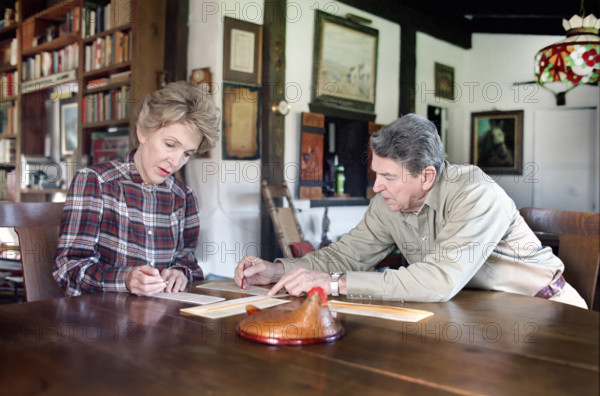 U.S. President Ronald Reagan and U.S. First Lady Nancy Reagan voting by absentee ballot in the 1988 U.S. presidential election, Rancho del Cielo, Santa Barbara, California, USA, President Ronald Reagan White House Photographic Office, October 29, 1988
