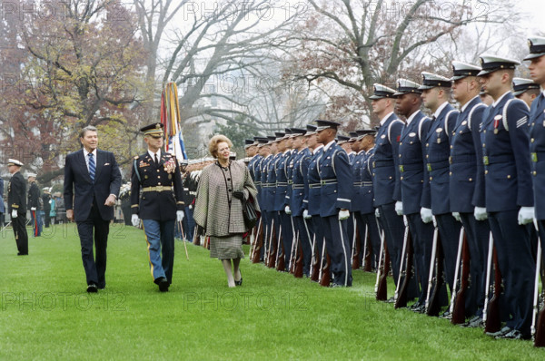 U.S. President Ronald Reagan and British Prime Minister Margaret Thatcher reviewing U.S. military troops on White House south lawn, Washington, D.C., USA, President Ronald Reagan White House Photographic Office, November 16, 1988