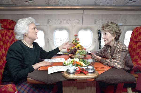 U.S. First Lady Nancy Reagan and U.S. Second Lady Barbara Bush on trip via First Lady airplane to Andrews Air Force Base, Prince George's County, Maryland, USA, President Ronald Reagan White House Photographic Office, December 7, 1988