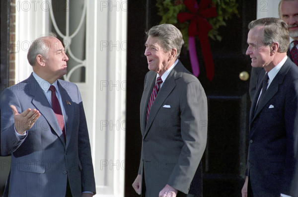 U.S. President Ronald Reagan and U.S. Vice President/U.S. President-elect George H.W. Bush with Soviet General Secretary Mikhail Gorbachev, Governors Island, New York City, New York, USA, President Ronald Reagan White House Photographic Office, December 7, 1988