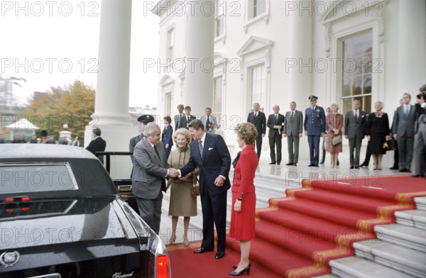 U.S. President Ronald Reagan and U.S. First Lady Nancy Reagan greeting Venezuelan President Luis Herrera Campins and Betty Urdaneta de Herrera Campins on steps of White House North Portico during State Visit, Washington, D.C., USA, President Ronald Reagan White House Photographic Office, November 17, 1981