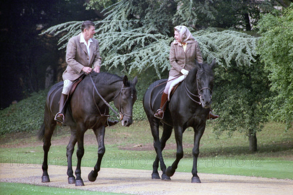 U.S. President Ronald Reagan riding horses with Queen Elizabeth II during visit to Windsor Castle, Windsor, Berkshire, England, UK, President Ronald Reagan White House Photographic Office, June 8, 1982