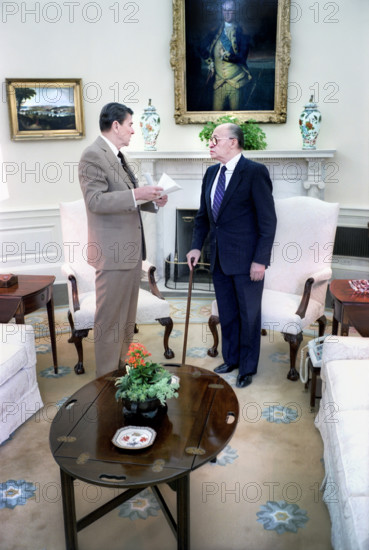 U.S. President Ronald Reagan meeting with Israeli Prime Minister Menachem Begin of Israel in the White House Oval Office, Washington, D.C., USA, President Ronald Reagan White House Photographic Office, June 21, 1982