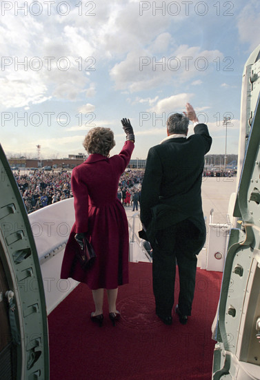 Former U.S. President Ronald Reagan and Former U.S. First Lady Nancy Reagan waving from airplane at their departure ceremony, Andrews Air Force Base, Camp Springs, Prince George's County, Maryland, USA, President Ronald Reagan White House Photographic Office, January 20, 1989