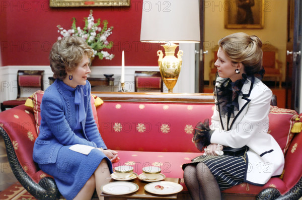 U.S. First Lady Nancy Reagan having tea with Queen Noor of Jordan in the White House Red Room, Washington, D.C., USA, President Ronald Reagan White House Photographic Office, March 16, 1982