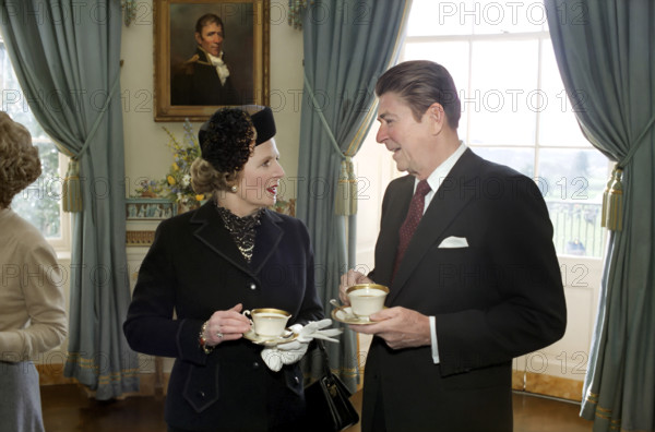 U.S. President Ronald Reagan with British Prime Minister Thatcher the White House Blue Room during her state visit, Washington, D.C., USA, President Ronald Reagan White House Photographic Office, February 26, 1981