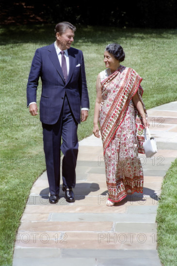 U.S. President Ronald Reagan walking with Prime Minister Indira Gandhi of India outside White House Oval Office, Washington, D.C., USA, President Ronald Reagan White House Photographic Office, July 29, 1982