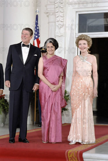 U.S. President Ronald Reagan and U.S. First Lady Nancy Reagan with Prime Minister Indira Gandhi of India on White House North Portico before state dinner, Washington, D.C., USA, President Ronald Reagan White House Photographic Office, July 29, 1982
