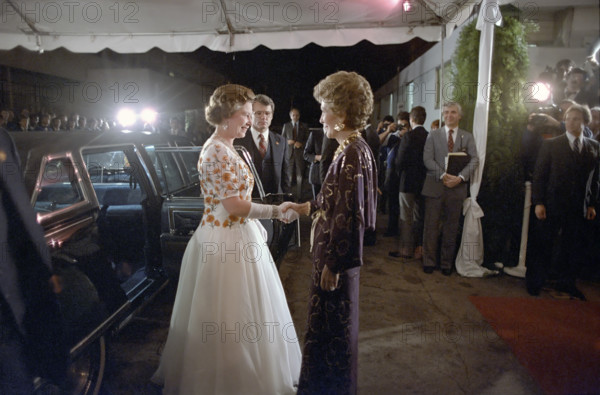 Arrival of Queen Elizabeth II and greeted by U.S. First Lady Nancy Reagan at reception and dinner, 20th Century-Fox Studios, Los Angeles, California, USA, President Ronald Reagan White House Photographic Office, February 27, 1983
