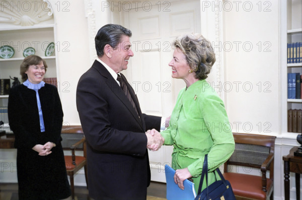 U.S. President Ronald Reagan meeting with American conservative activist Phyllis Schlafly in White House Oval Office, Washington, D.C., USA, President Ronald Reagan White House Photographic Office, March 21, 1983