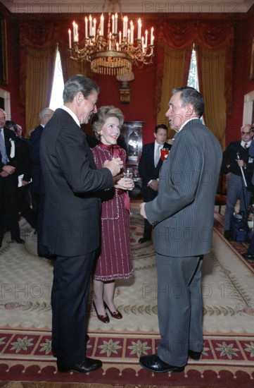 U.S. President Ronald Reagan and U.S. First Lady Nancy Reagan with Andrei Gromyko, Minister of Foreign Affairs of the Soviet Union, at a reception in his honor, White House Red Room, Washington, D.C., USA, President Ronald Reagan White House Photographic Office, September 28, 1984
