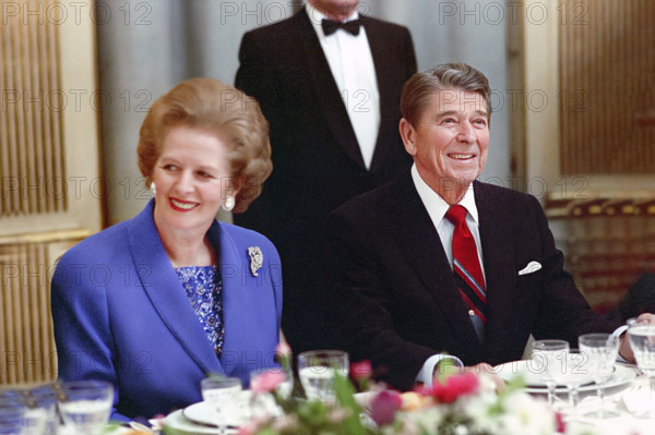 U.S. President Ronald Reagan sitting next to British Prime Minister Margaret Thatcher during dinner at Chateau of Val-Duchesse, Brussels, Belgium, President Ronald Reagan White House Photographic Office, March 2, 1988