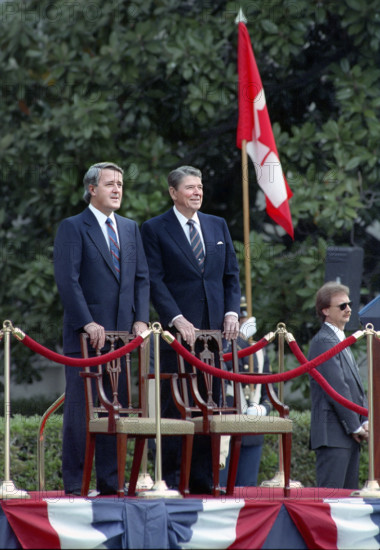 U.S. President Ronald Reagan with Prime Minister Brian Mulroney of Canada during Mulroney's arrival ceremony on White House South Lawn, Washington, D.C., USA, President Ronald Reagan White House Photographic Office, April 27, 1988