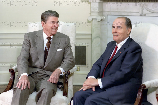 U.S. President Ronald Reagan meeting with President of France Francois Mitterrand in the White House Oval Office, Washington, D.C., USA, President Ronald Reagan White House Photographic Office, September 29, 1988