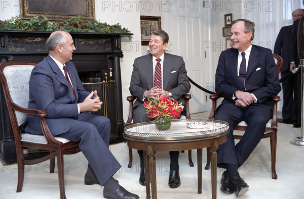 U.S. President Ronald Reagan and U.S. Vice President/U.S. President-elect George H.W. Bush with Soviet General Secretary Mikhail Gorbachev, Governors Island, New York City, New York, USA, President Ronald Reagan White House Photographic Office, December 7, 1988