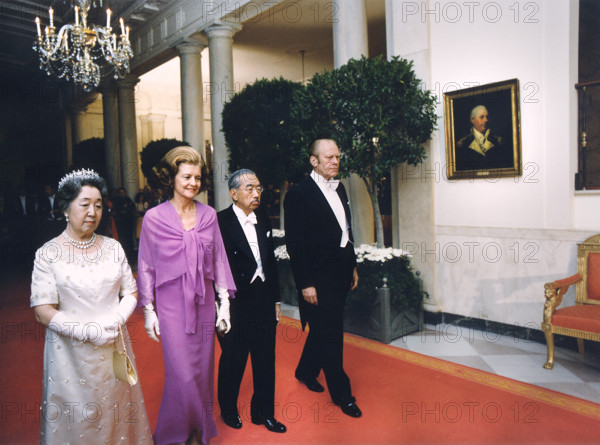 U.S. President Gerald Ford, U.S. First Lady Betty Ford, Emperor Hirohito and Empress Nagako walking down the White House Cross Hall towards the East Room prior to state dinner held in honor of the Japanese Heads of State, Washington, D.C., USA, Gerald R. Ford White House Photographs, October 2, 1975
